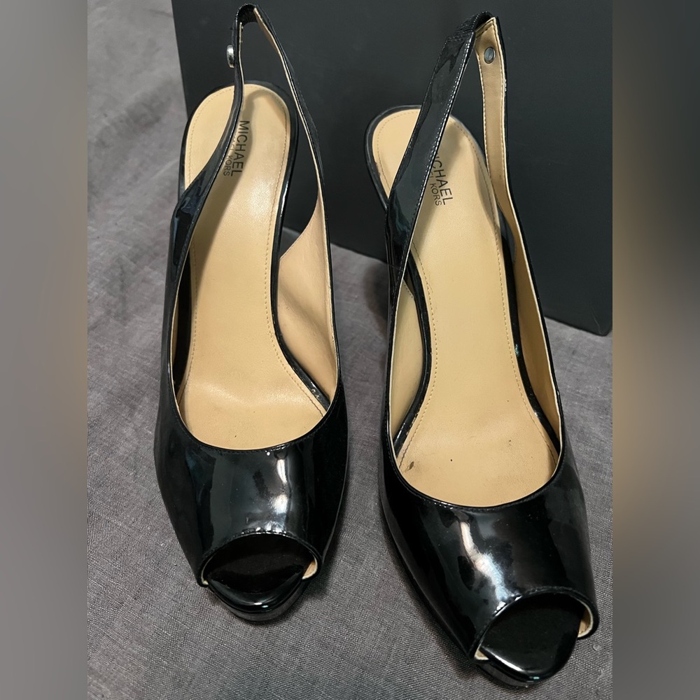 Black Michael Kors patent leather sling backs